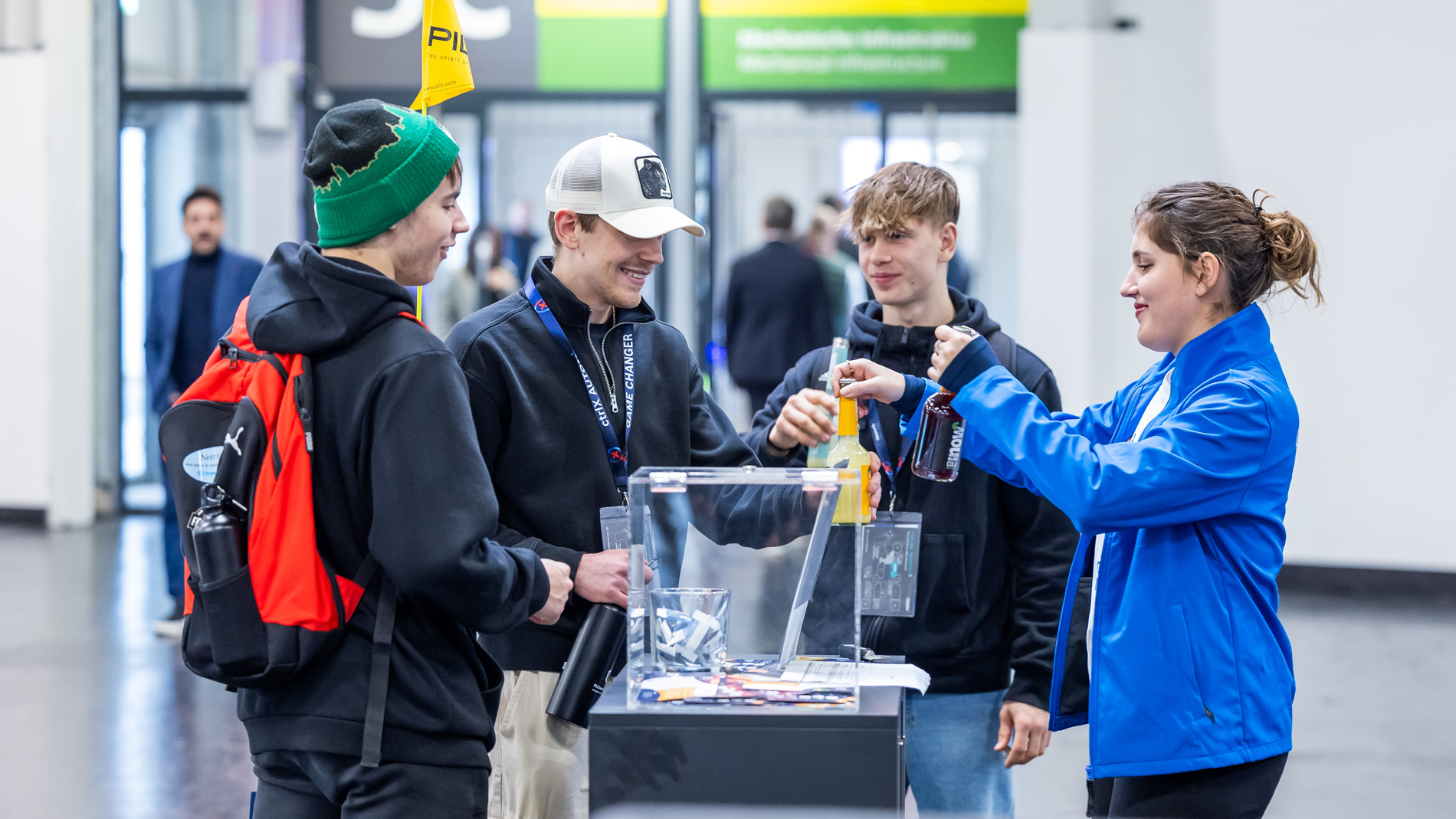 Effort pays off: participants of the Young Talents Rallye receive a refreshment at the SPS.